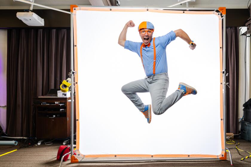 Los Angeles, CA - April 21: Clayton Grimm, "Blippi," in the Los Angeles Times Portrait Studio at the Festival of Books in Los Angeles, CA, Sunday, April 21, 2024. (Myung J. Chun / Los Angeles Times)