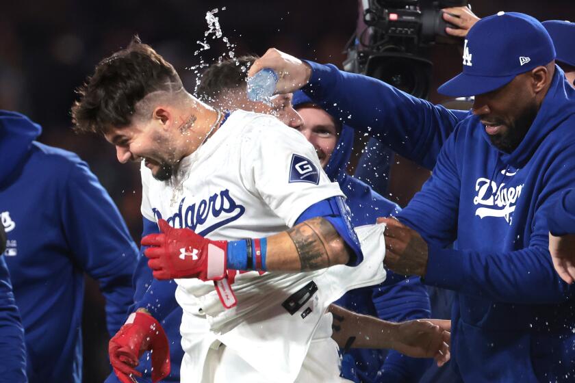 LOS ANGELES, CALIFORNIA - May 3: Dodgers Andy Pages celebrates after the game-winning.