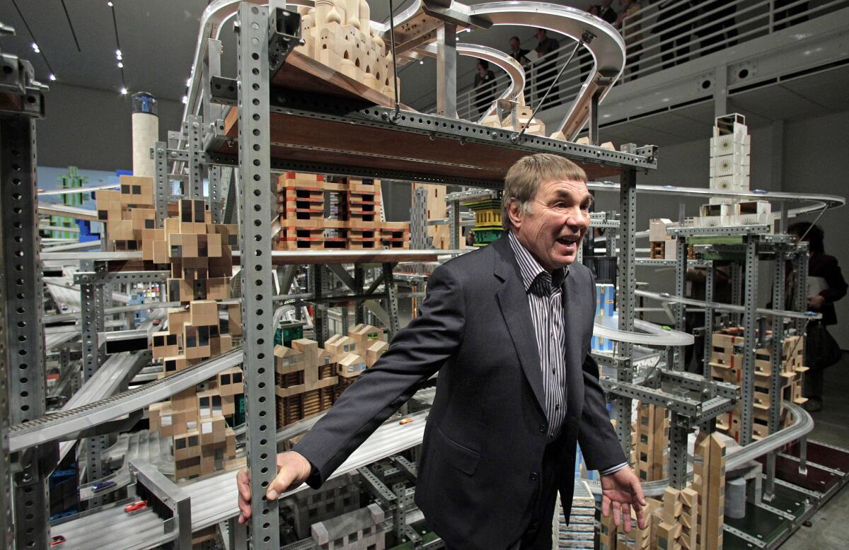 Artist Chris Burden introduces his kinetic sculpture Metropolis II at LACMA in 2012.world.
