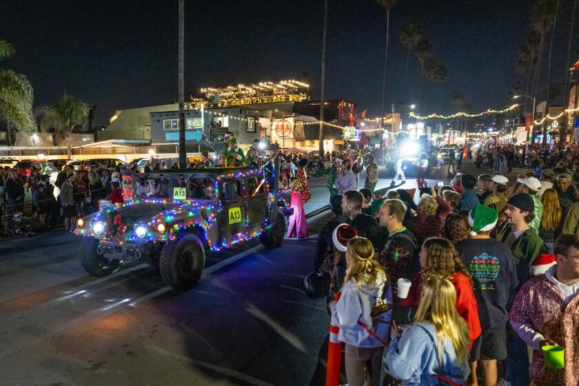 Newport Avenue shines bright during the Ocean Beach Holiday Parade.