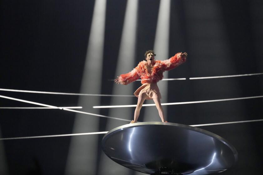 Nemo of Switzerland performs the song The Code during the Grand Final of the Eurovision Song Contest in Malmo, Sweden, Saturday, May 11, 2024. (AP Photo/Martin Meissner)