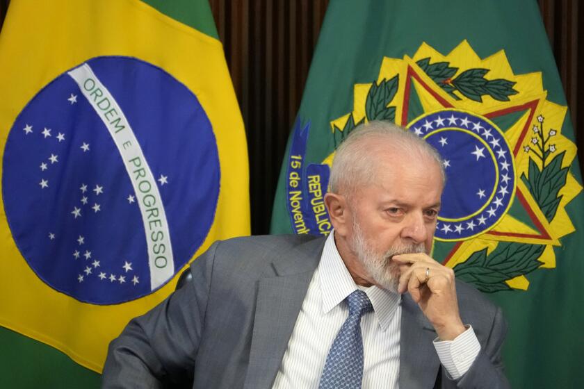 Brazil's President Luiz Inacio Lula da Silva attends a ministerial meeting on plans to support Rio Grande do Sul state, which was affected by floods, at the presidential palace, in Brasilia, Brazil, Monday, May 13, 2024. (AP Photo/Eraldo Peres)