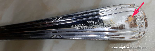 A chromium-plated stainless steel pie server.