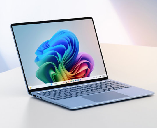 Surface Laptop 7th Edition 13.8" in Sapphire shown in a three-quarters view.