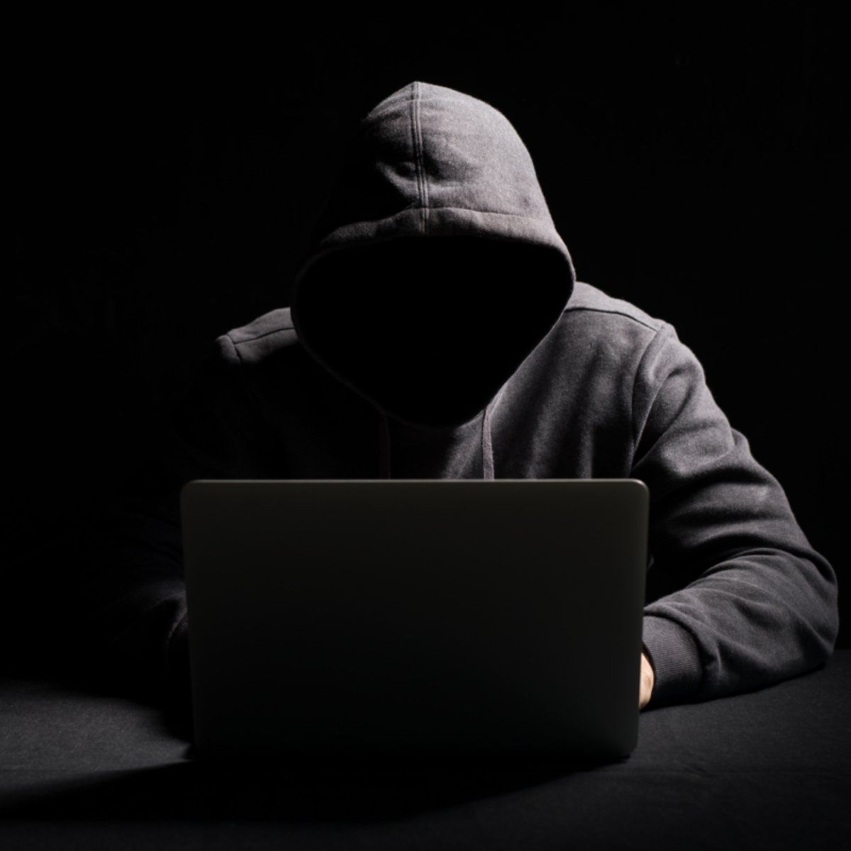 Hacker at laptop