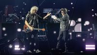 Brian May and Jean Michel-Jarre onstage