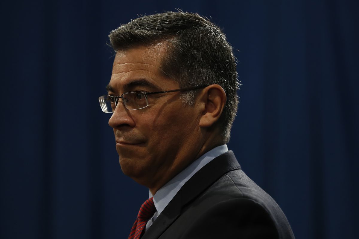 California Attorney General Xavier Becerra reacts during a press conference at the California State Capitol on March 7, 2018 in Sacramento, California. The press conference came in response to an earlier by U.S. Attorney General Jeff Sessions at a nearby