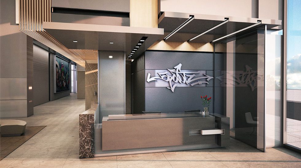 The lobby of a residential building. There is a sign above the desk that reads: 5 Pointz.