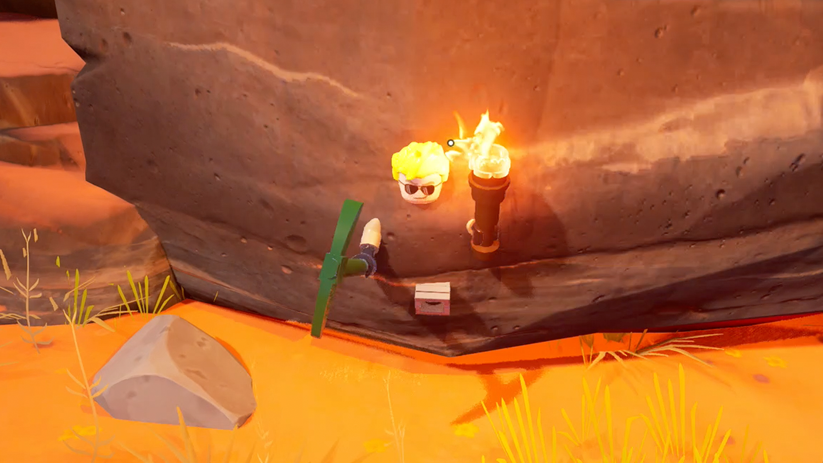 Lego Fortnite player clipping through a rock in the desert