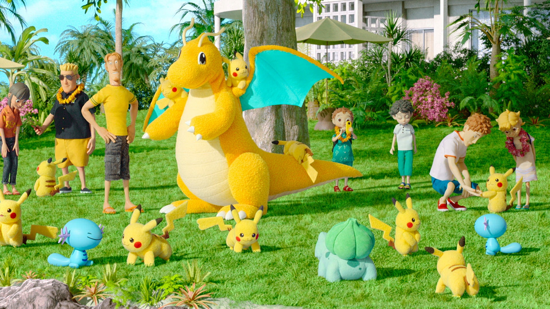 A bunch of humans hanging out with Pokemon on a lawn in the stop-motion series Pokémon Concierge.
