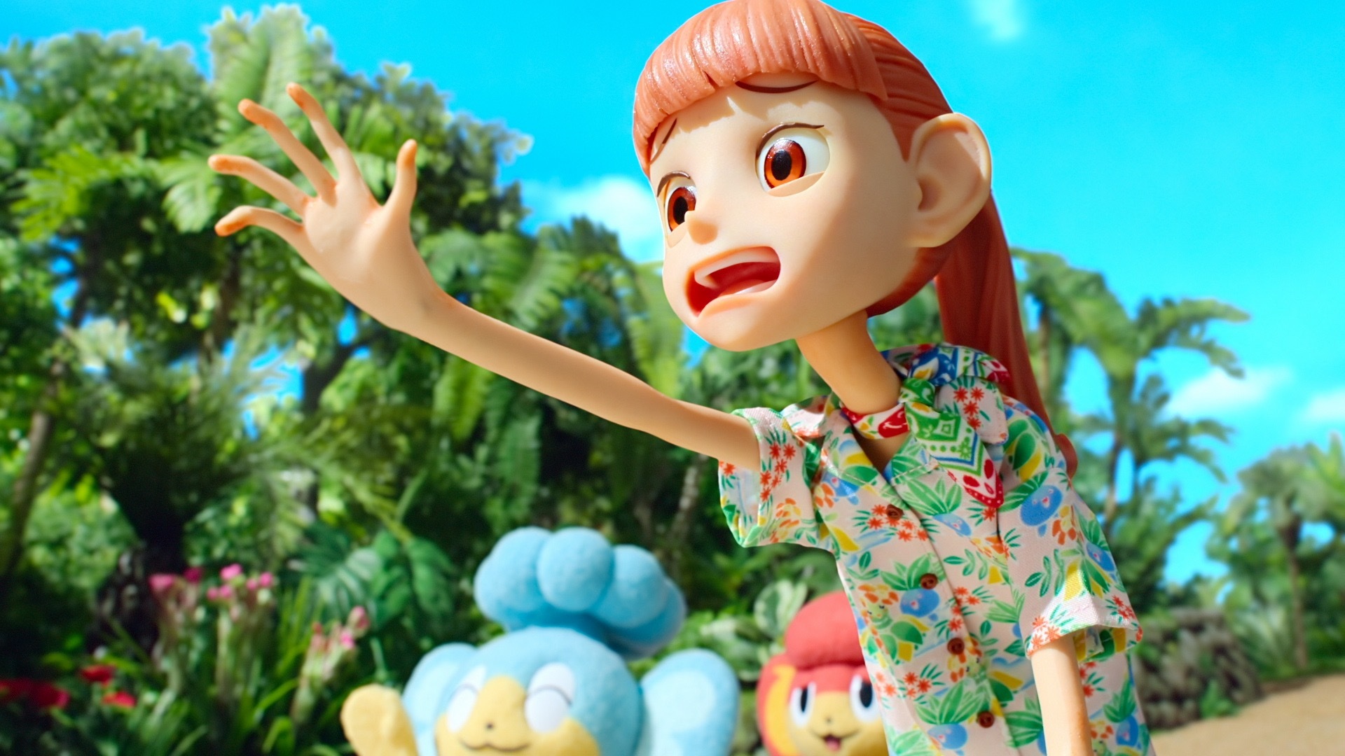 A still from the stop-animation show Pokemon Concierge. Haru reaches out with her hand beyond the camera and looks worried about something in the distance. She’s created with clay and her mouth is wide open in worry.
