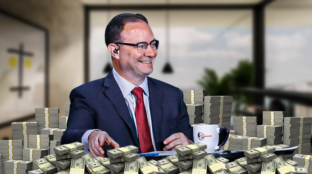 Adrian Wojnarowski surrounded by piles of cash.