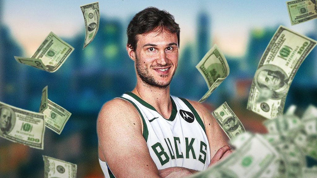 Danilo Gallinari surrounded by piles of cash.