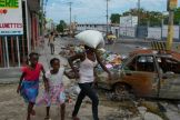People flee their homes in Haiti's capital after gang attacks, May 2,  2024