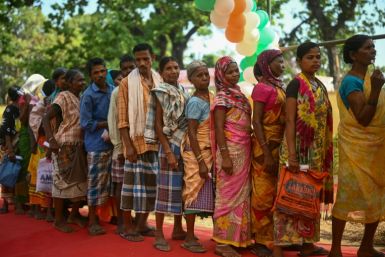 Voters queue to vote in India's Dugeli village, site of a decades-old Maoist insurgency