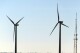 Land-based wind turbines spin in Atlantic City. N.J., on Nov. 3, 2023. On Tuesday, April 30, 2024, New Jersey utility regulators opened a fourth round of solicitations for new offshore wind farm proposals to join the three that already have preliminary approval. (AP Photo/Wayne Parry)