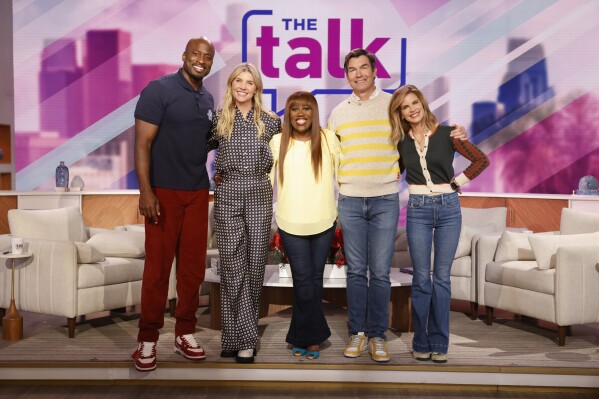 From left: Hosts of the CBS talk show "The Talk" Akbar Gbajabiamila, Amanda Kloots, Sheryl Underwood, Jerry O’Connell and Natalie Morales pose for a photo for the season 14 premiere which aired Feb. 23, 2023. The talk show is ending after its 15h season in December, CBS confirmed Friday, April 12, 2024. (Sonja Flemming /CBS via AP)
