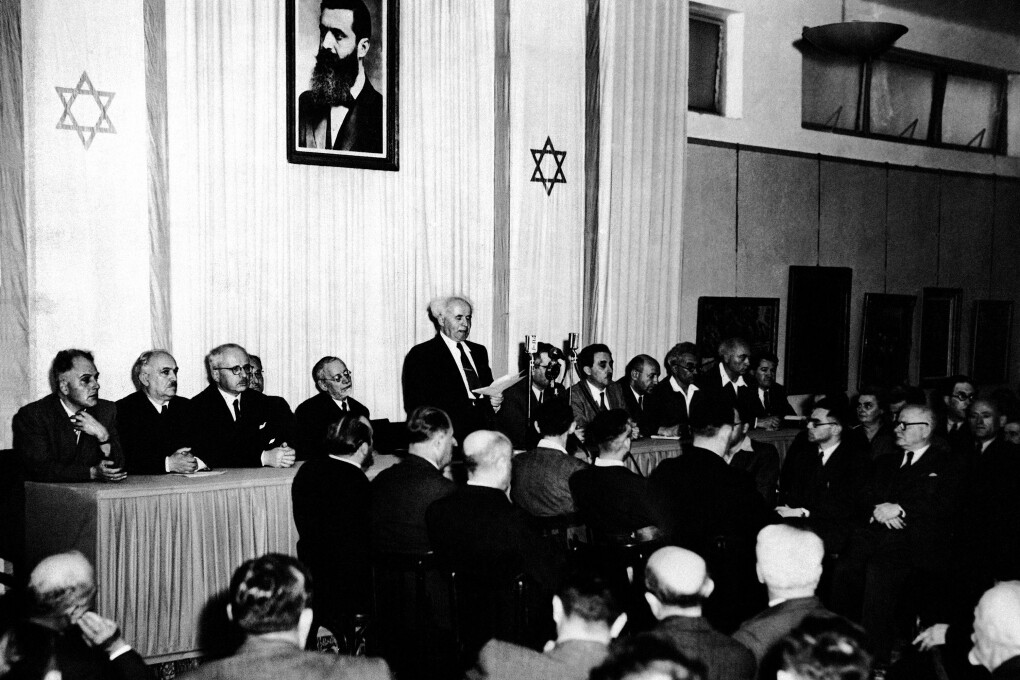 FILE - In this May 14, 1948 file photo, Cabinet Ministers of the new state of Israel are seen at a ceremony at the Tel Aviv Art Museum, marking the creation of the new state.during Premier and Defense Minister David Ben Gurion's speach. In 65 years, Israel has surpassed even the wildest dreams of its founding fathers. Against all odds, it has emerged as the Middle East's greatest military force, a global high-tech powerhouse and a prosperous, secure homeland for the Jewish people. (AP Photo, File)
