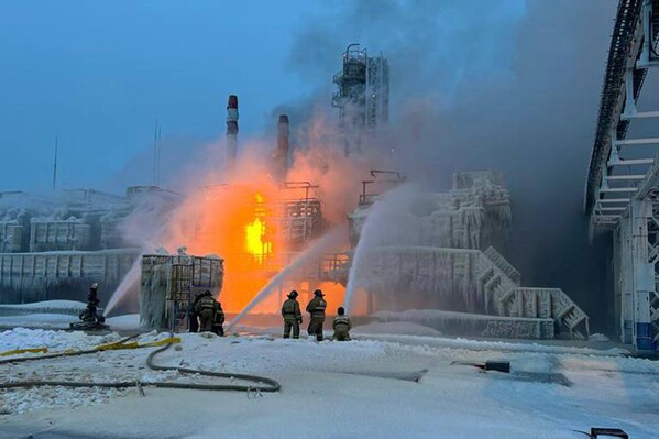 In this photo released by Telegram Channel of Leningrad Region Governor Alexander Drozdenko fire fighters extinguish the blaze at Russia's second-largest natural gas producer, Novatek in Ust-Luga, 165 kilometers southwest of St. Petersburg, Russia, Sunday, Jan. 21, 2024. Fire broke out at a chemical transport terminal at Russia's Ust-Luga port Sunday following two explosions, regional officials reported. Local media reported that the port had been attacked by Ukrainian drones, causing a gas tank to explode. (Telegram Channel of Leningrad Region Governor Alexander Drozdenko via AP)