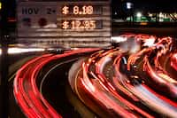 The price changes from $12.35  to $9.90 as evening rush hour traffic subsides on the...