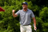 Bryson DeChambeau celebrates after a putt on the eighth hole during the final round of the...