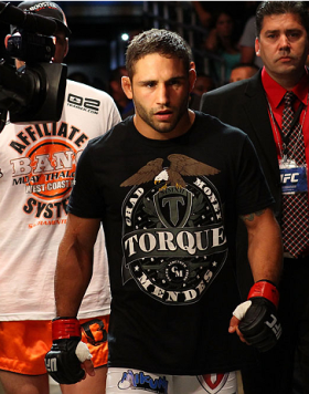 MILWAUKEE, WI - AUGUST 31:  Chad Mendes enters the arena prior to his UFC featherweight bout against Clay Guida at BMO Harris Bradley Center on August 31, 2013 in Milwaukee, Wisconsin. (Photo by Ed Mulholland/Zuffa LLC/Zuffa LLC via Getty Images) *** Loca