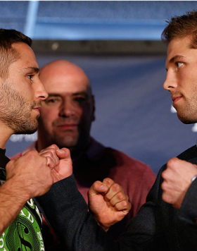 SACRAMENTO, CA - DECEMBER 12:  (L-R) Opponents Chad Mendes and Nik Lentz face off during the final pre-fight press conference before the UFC on FOX event at Sleep Train Arena on December 12, 2013 in Sacramento, California. (Photo by Josh Hedges/Zuffa LLC/