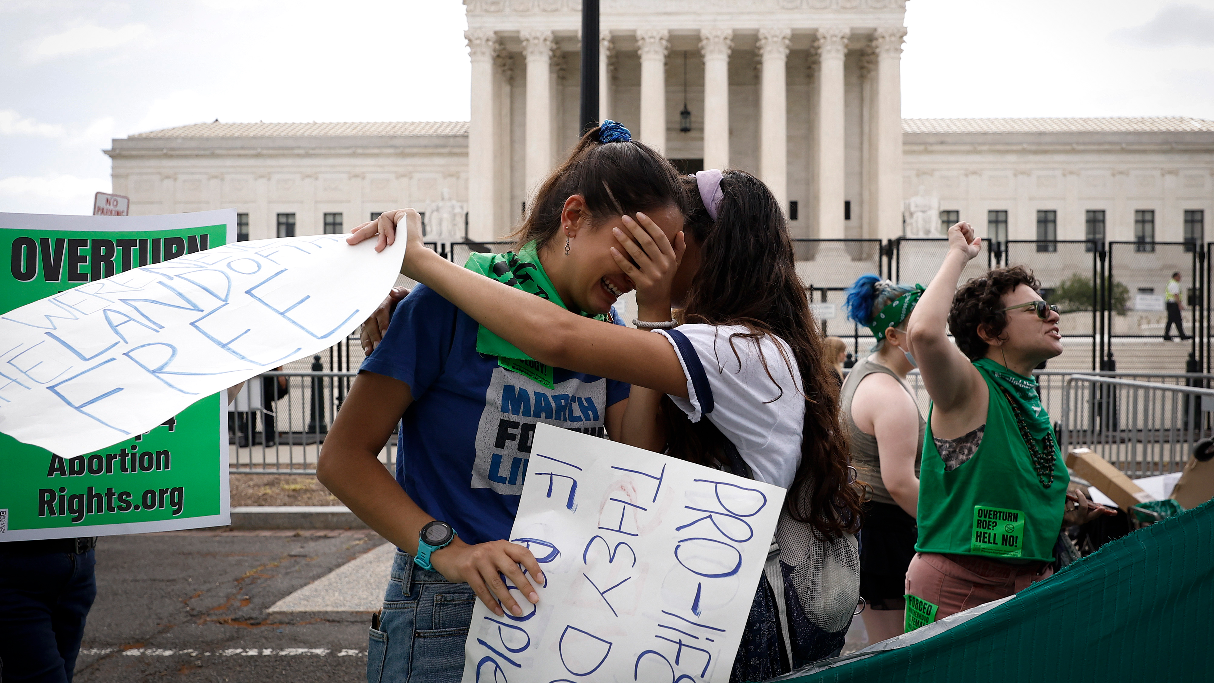 Abortion rights activists react in front of the Supreme Court in Washington on June 24.