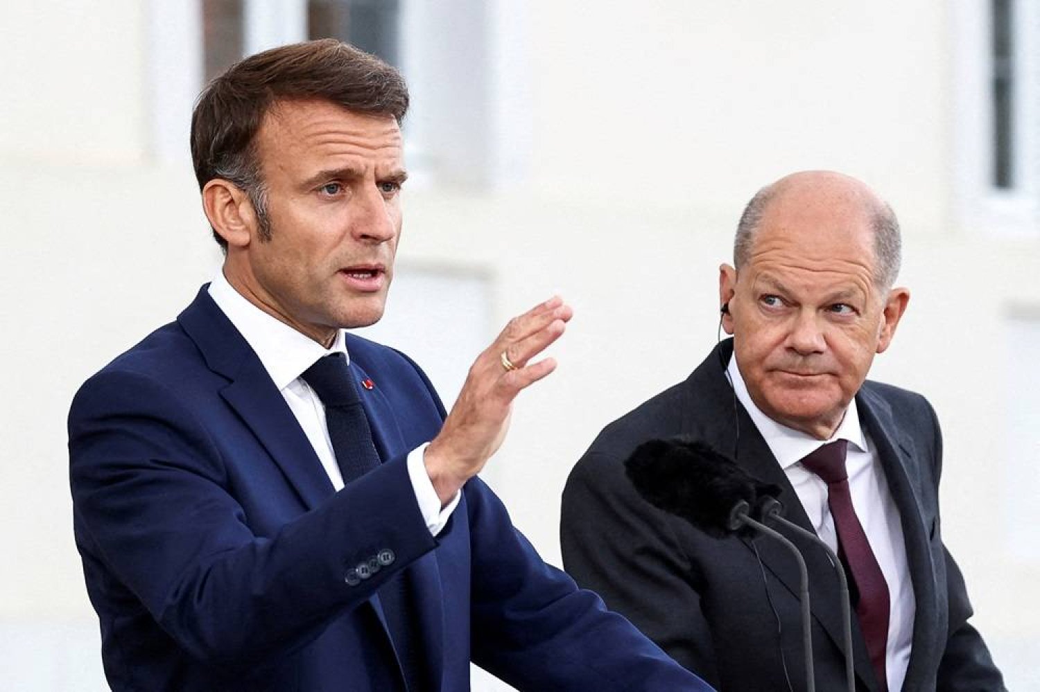  German Chancellor Olaf Scholz looks on as French President Emmanuel Macron speaks to reporters on the day of a joint Franco-German cabinet meeting at the German government's guest house, Schloss Meseberg castle north of Berlin, in Gransee, Germany, May 28, 2024. (Reuters)