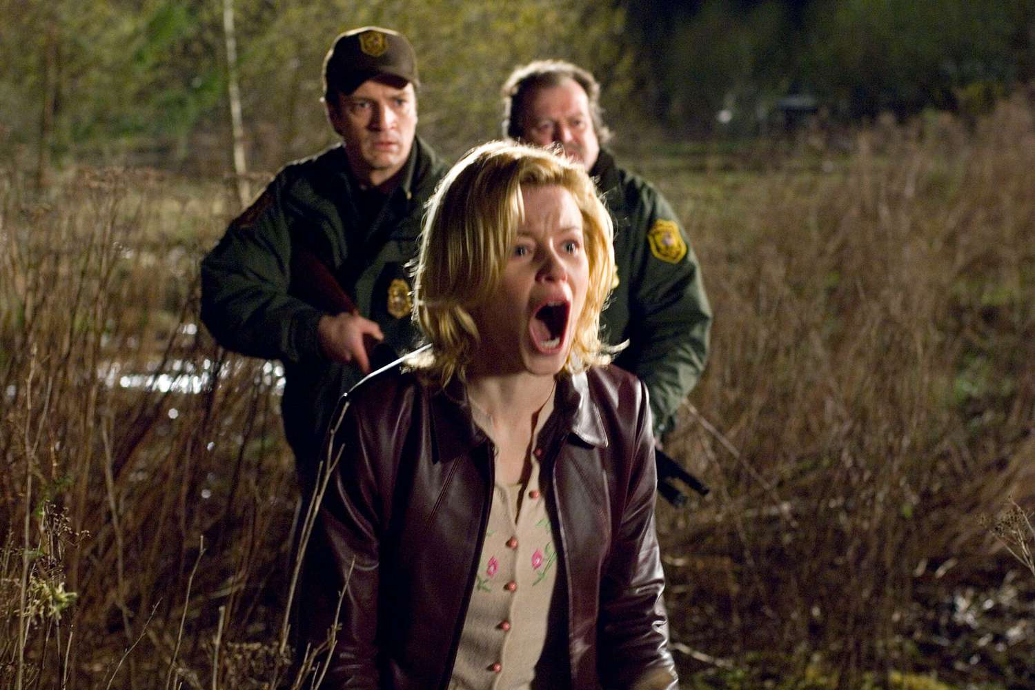 Slither (2006) (L to R) NATHAN FILLION, ELIZABETH BANKS and DON THOMPSON