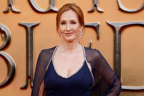 J.K Rowling poses on the red carpet after arriving to attend the World Premiere of the film "Fantastic Beasts: The Secrets of Dumbledore" in London on March 29, 2022.