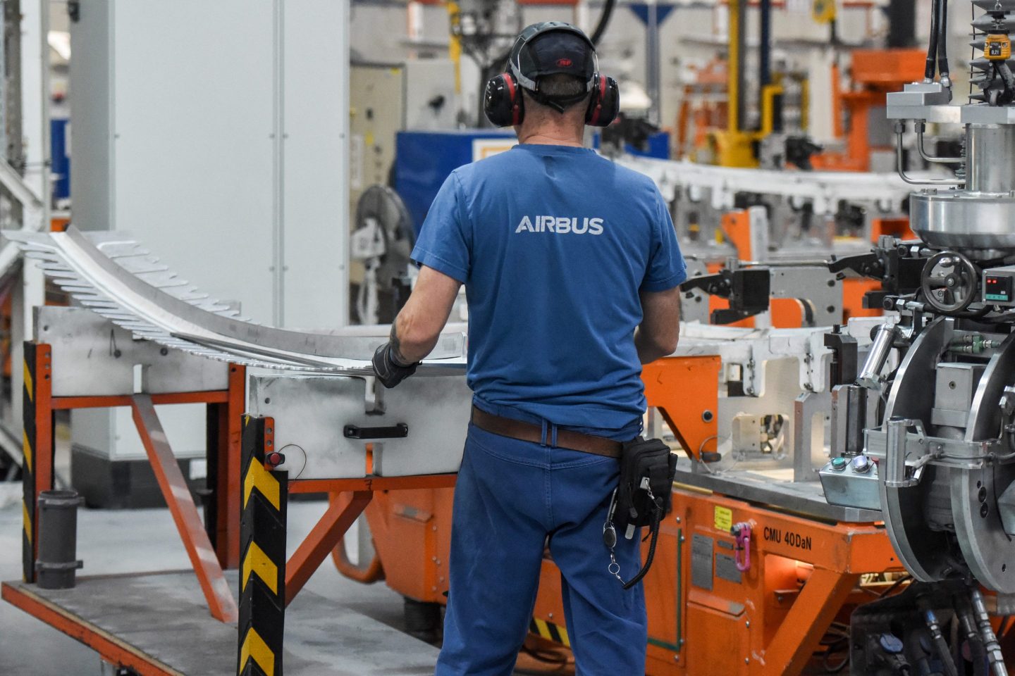 An Airbus&#8217; employee works on an aircraft part of the Airbus A350 at the Airbus Atlantic plant in Bouguenais, near Nantes, western France, on February 29, 2024. (Photo by Sebastien SALOM-GOMIS / AFP) (Photo by SEBASTIEN SALOM-GOMIS/AFP via Getty Images)