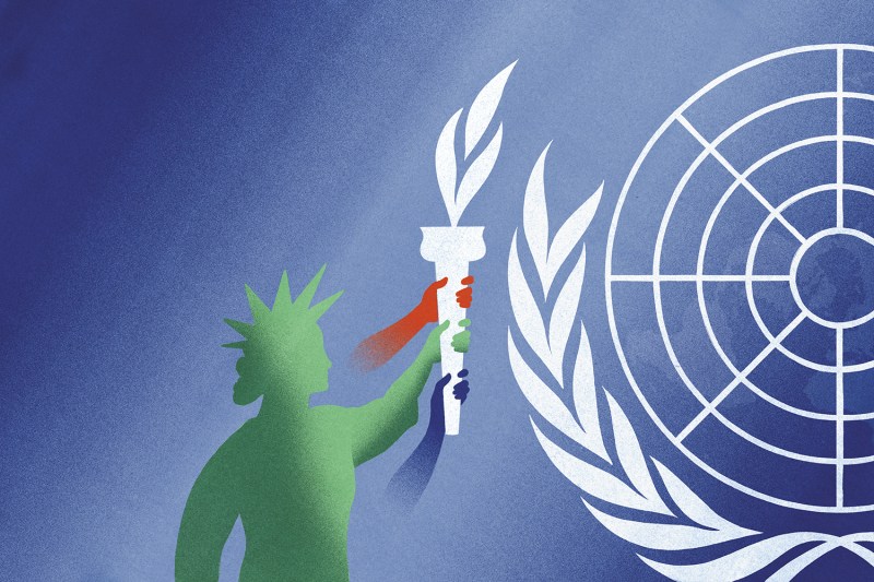 An illustration shows the Statue of Liberty holding a torch with other hands alongside hers as she lifts the flame, also resembling laurel, into place on the edge of the United Nations laurel logo.