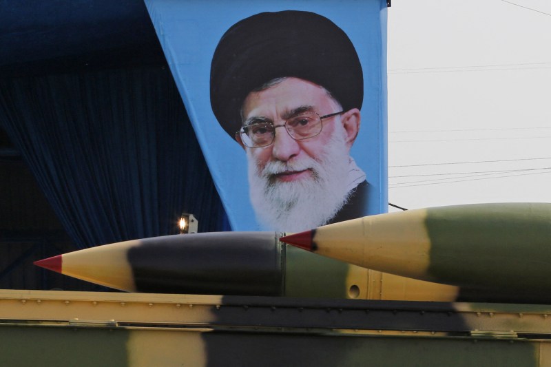 An Iranian military truck carries surface-to-air missiles past a portrait of Iran's Supreme Leader Ayatollah Ali Khamenei during a parade on the occasion of the country's annual army day on April 18, 2018, in Tehran.