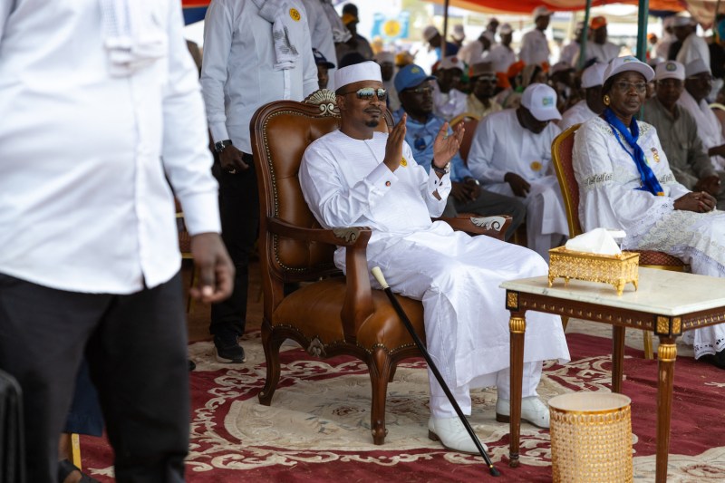Mahamat Idriss Déby Itno, transitional president and candidate for the presidential election in Chad, sits after his meeting in the stadium under construction in the Dombao district, in Moundou, on April 25, 2024. (Photo by Joris Bolomey / AFP)
