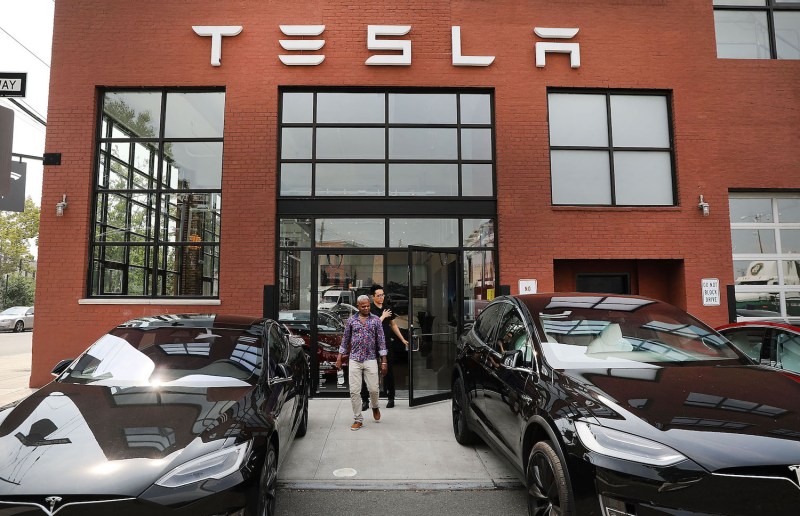 Tesla vehicles stand outside of a Brooklyn showroom and service center in New York City.
