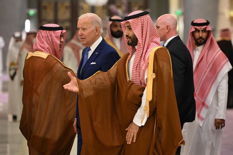 US President Joe Biden and Saudi Crown Prince Mohammed bin Salman arrive for the family photo during the Jeddah Security and Development Summit (GCC+3) at a hotel in Saudi Arabia's Red Sea coastal city of Jeddah on July 16, 2022.