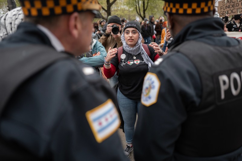 Police try to block students and faculty members from the School of the Art Institute of Chicago, Roosevelt University, and Columbia College Chicago amid a pro-Palestinian demonstration in Chicago, on April 26.
