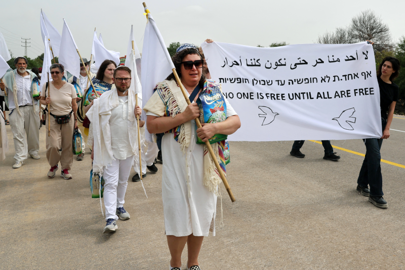 U.S. and Israeli rabbis and rabbinical students, joined by peace activists, march toward the Erez crossing on the border with northern Gaza Strip to call for a permanent cease-fire on April 26.