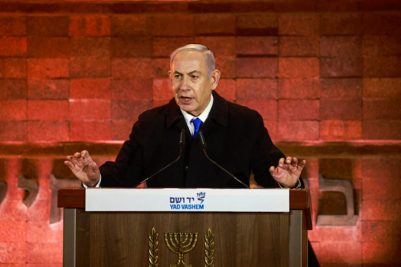 Israeli Prime Minister Benjamin Netanyahu speaks during a ceremony marking Holocaust Remembrance Day at the Yad Vashem Holocaust memorial in Jerusalem.