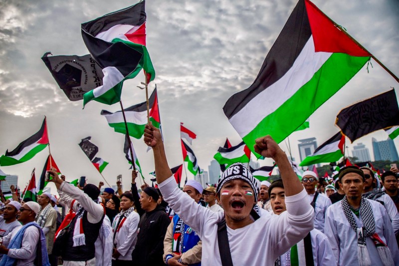 Indonesians take part in a pro-Palestinian rally at the National Monument park in Jakarta on December 2, 2023.