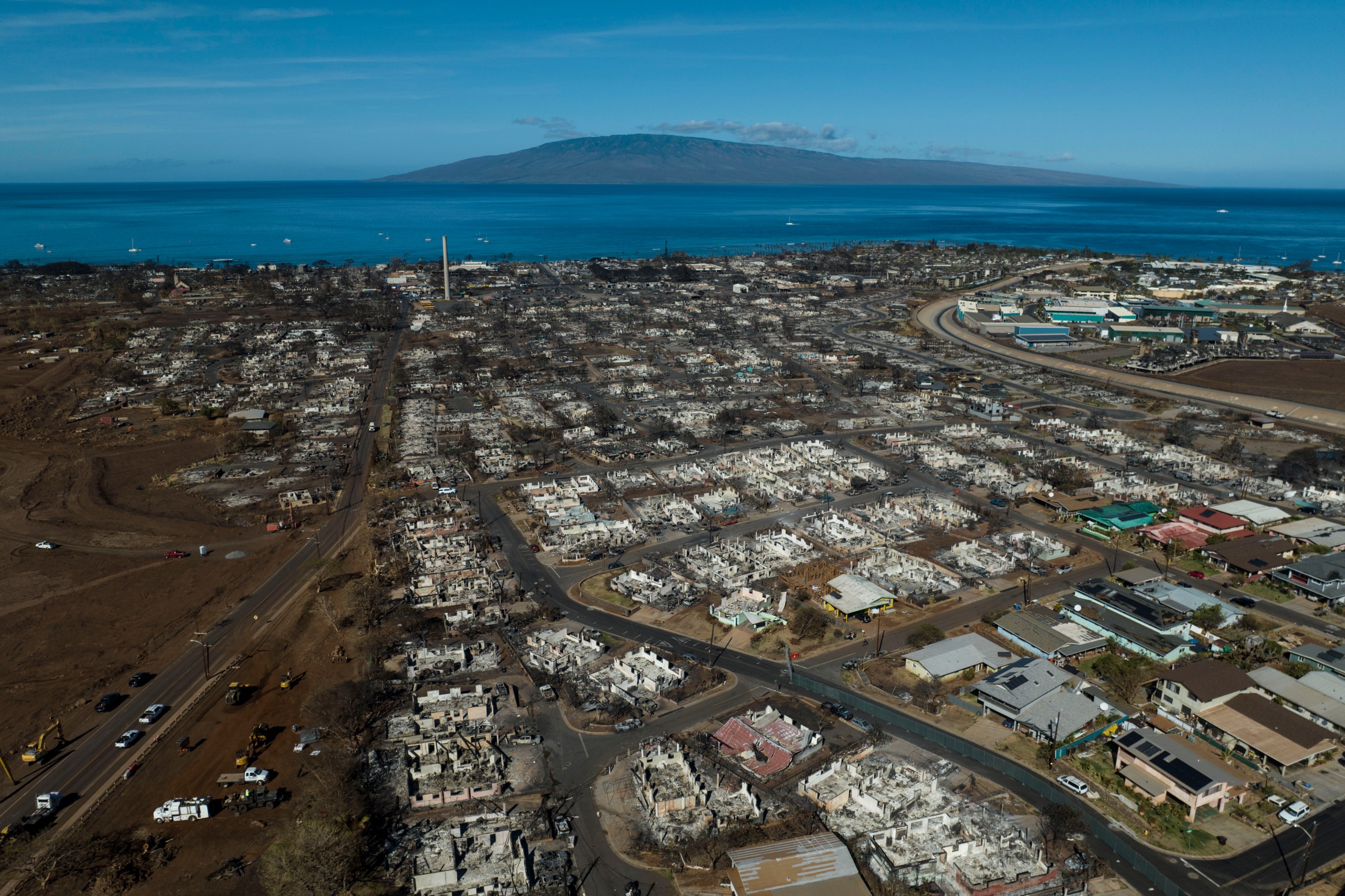 FILE - A general view shows the aftermath of a wildfire in Lahaina, Hawaii, Thursday, Aug. 17, 2023. A University of Hawaii study examining the health effects of last year's deadly wildfires on Maui found that up to 74% of participants may have difficulty breathing and otherwise have poor respiratory health, and almost half showed signs of compromised lung function. (AP Photo/Jae C. Hong, File)
