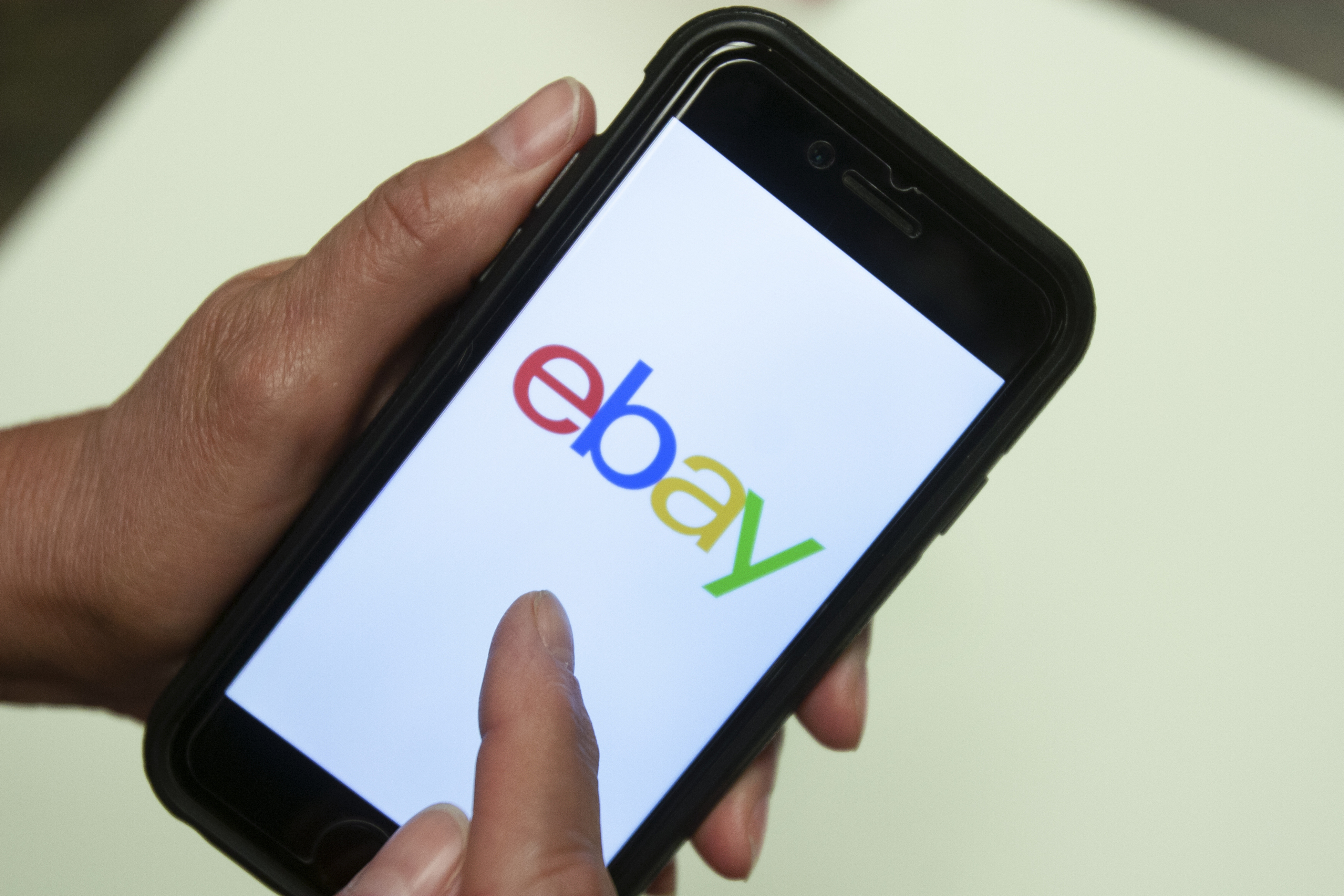 FILE - An eBay app is shown on a mobile phone, July 11, 2019, in Miami. Online marketplace behemoth eBay said it plans to no longer accept American Express, Wednesday, June 5, 2024, citing what the company says are “unacceptably high fees” and that customers have other payment options to shop online. I(AP Photo/Wilfredo Lee, File)