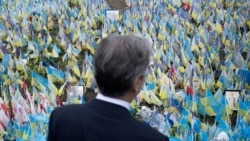 U.S. Secretary of State Antony Blinken pays his respects to fallen Ukrainian soldiers at a makeshift memorial in Kyiv, Ukraine, May 14, 2024.