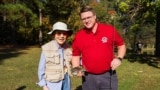 VOA correspondent Kane Farabaugh with former First Lady Rosalynn Carter. 