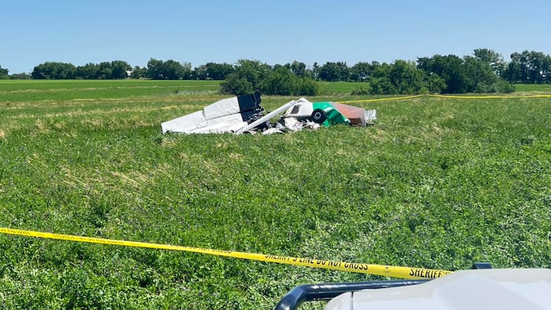 Officials say a small airplane crashed into a hay field near the runways of Butler Memorial...