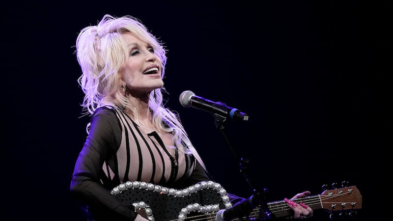 Dolly Parton performs during an event celebrating the Kansas statewide expansion of Dolly...