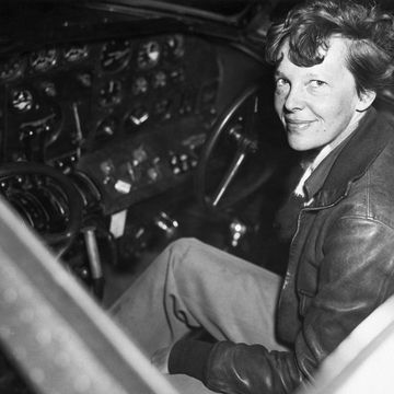 amelia earhart in the cockpit of an airplane