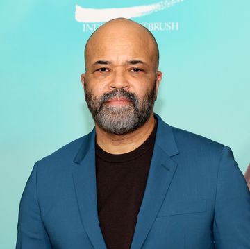 jeffrey wright attends the asteroid city premiere wearing a dark teal jacket and a black top