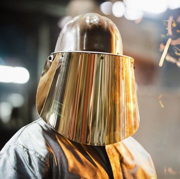 steel worker in protective headwear